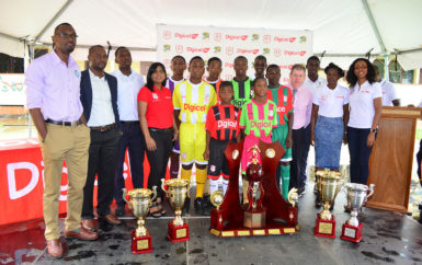 Members of the launch party at the 6th Annual Digicel u-18 Secondary Schools Championship inclusive of Director of Sports Christopher Jones (left), GFF President Wayne Forde (2nd from left), Digicel CEO Kevin Kelly (4th from right) and Digicel Marketing Manager Jacqueline James (right).  