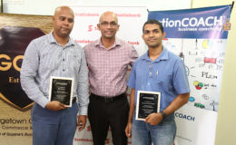 President of the GCCI Vishnu Doerga (centre) with representatives of Rid-O-Pes and Oriental Furniture Store, which were recognised for being the most improved one-on-one and group coaching clients, respectively, by ActionCoach. 