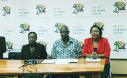 From left are Junior Education Minister Nicolette Henry, Independence Activities Coordinator Lennox Canterbury and Media Coordinator Carolyn Walcott. 