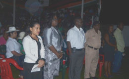 Minister Karen Cummings (second from left) at the opening of the flag-raising ceremony (GINA photo)