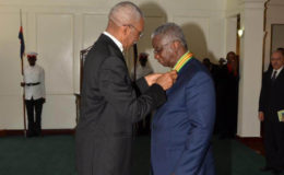 President David Granger conferring Prime Minister of Barbados, Freundel Stuart with the Order of Roraima.   (Ministry of the Presidency photo)