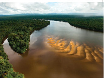 “Guyana’s largest and longest river, the mighty Essequibo, runs, like a backbone, through the country. It rises in the deep south of Guyana in the Acarai Mountains before traveling 1,010 kilomotres to empty into the Atlantic Ocean west of Georgetown.”