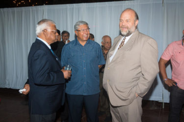 US Ambassador Perry Holloway (right) in conversation with businessman Sattaur Gafoor (left) and GuySuCo’s Errol Hanoman.