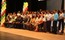 The awardees yesterday after the ceremony held in their honour, posing with their trophies and plaques. Seated among them in the front row are (beginning fourth from left) Chief Education Officer Olato Sam, Director of School of the Nations Dr Brian O’Toole, and Minister of Education Dr Rupert Roopnaraine. (Photo by Keno George)