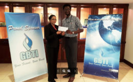 In Picture: Marketing Manager Ms. Pamela Binda and GLTA’s President Jamal Goodluck with the sponsorship cheque.
 