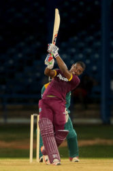 Opener Evin Lewis hits through the off-side during his unbeaten 71 against South Africa on Sunday. (Photo courtesy WICB Media)