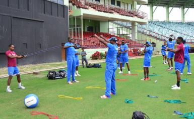 Some of the West Indies players doing stretches during the first training session at Providence.(Orlando Charles photo)