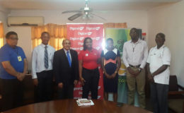 Four-time Olympian, Aliann Pompey (third from right) poses for a photo with the principals of the Aliann Pompey Invitational yesterday at Olympic House. 
