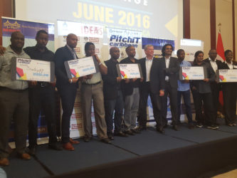 Intellect Storm’s CEO Rowen Willabus (second, left) and Marketing Manager Ronson Grey (first, left) along with the other four winners of the ‘PitchIT Caribbean Challenge’ which concluded yesterday in Montego Bay, Jamaica.  