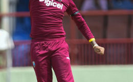 Off-spinner Sunil Narine celebrates another wicket during Friday’s four-wicket victory over South Africa. (Photo courtesy WICB Media) 