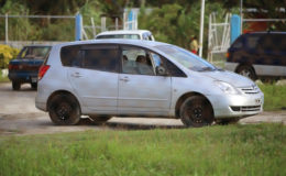 The vehicle suspected to have been used to transport the persons who threw a grenade near the vehicle of Kaieteur News publisher Glenn Lall on Saturday evening was parked inside the East La Penitence Police station yesterday afternoon. 