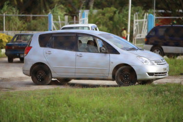 The vehicle suspected to have been used to transport the persons who threw a grenade near the vehicle of Kaieteur News publisher Glenn Lall on Saturday evening was parked inside the East La Penitence Police station yesterday afternoon. 