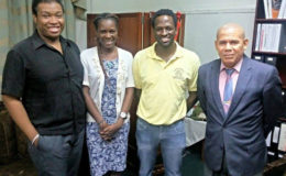 SASOD Representatives (l-r) Projects Coordinator, John Quelch; Advocacy and Communications Officer Schemel Patrick and Managing Director, Joel Simpson pose with Minister of Public Health, Dr. George Norton.