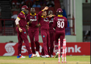 Some West Indies players celebrate the fall of  a wicket during Match 2 of the Ballr Cup Tri-Nation Series between West Indies and Australia at Guyana National Stadium, Providence on Sunday. Photo by WICB Media/Randy Brooks of Brooks Latouche Photography 