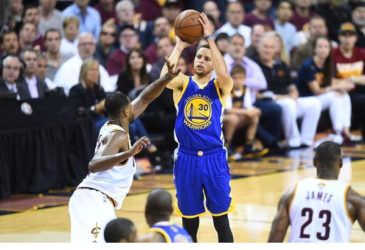 Golden State Warriors guard Stephen Curry (30) shoots the ball over Cleveland Cavaliers center Tristan Thompson (13) during the first half in game three of the NBA Finals at Quicken Loans Arena. Mandatory Credit: David Richard-USA TODAY Sports
