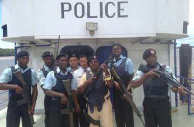 Police aboard the M B Tamakay (Police photo) 
