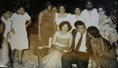 Muhammad Ali (seated, centre) poses with guests at a reception held in his honour at Hamilton Green’s home in 1979. 