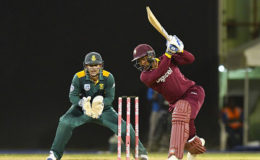 ON THE GO: Denesh Ramdin bats during the opening game against South Africa at the Tri-Nations Series. 