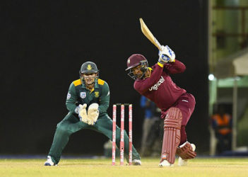 ON THE GO: Denesh Ramdin bats during the opening game against South Africa at the Tri-Nations Series. 