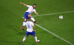 Graziano Pelle volleys home Italy’s second goal.