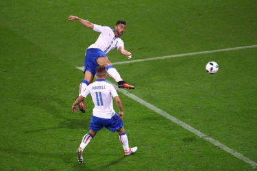 Graziano Pelle volleys home Italy’s second goal.