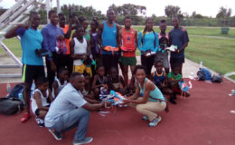 Some of the Running Brave Athletic Club (RBAC) athletes pose with their Adidas and Nike spikes presented by former national 800 and 1500m athlete, Robin Bishop.
