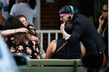 Mourners arrive at the funeral of Kimberly Morris in Kissimmee, Florida, U.S., June 16, 2016. Morris was one of the 49 people killed in the shooting incident at a nightclub in Orlando June 12. REUTERS/Carlo Allegri 