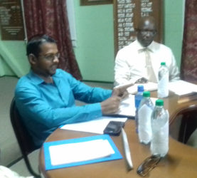 Chairman Vickchand Ramphal (centre) at the meeting 