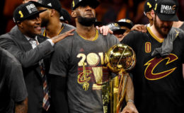 Cleveland Cavaliers forward LeBron James celebrates with the Larry O’Brien Championship Trophy after beating the Golden State Warriors in game seven. (Reuters)