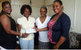 From left are Rebecca Miskiri-Antoine, Delores Collins and Joycelyn Thompson, members of the Baveghems family. Also in picture is Daniella King (right), Assistant Registrar-Students’ Welfare, UG.
