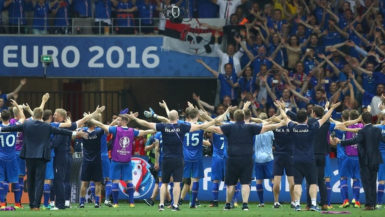 Iceland’s victorious players celebrate with their fans after the final whistle.