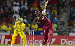  Captain Jason Holder hits through the off-side during his 34 against Australia in the final of the Tri-Nations Series. (Photo courtesy WICB Media) 