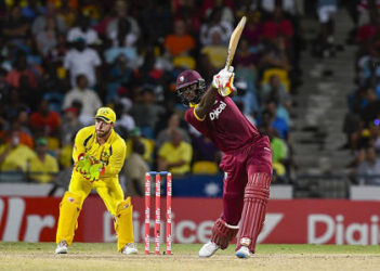  Captain Jason Holder hits through the off-side during his 34 against Australia in the final of the Tri-Nations Series. (Photo courtesy WICB Media) 