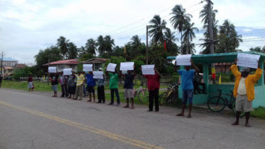 Fishermen protesting at Port Mourant yesterday 