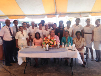President of FACES, Sabrina Kazim (sitting at  left), Chairman of the Board of Directors of the GPHC, Max Hanoman (seated second from left), Collene Hicks, Director of Nursing in Guyana (seated second from right) and Customer Care Consultant, Joyce Sinclair (seated at right) flanked by the nurses who were recognised for their stellar performance.   