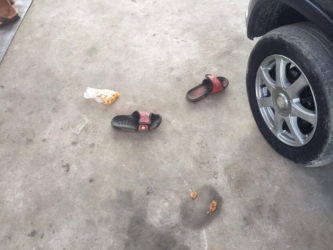 Jahmaul Lewis’ footwear and the plantain chips he was eating, left on the ground after he was shot  