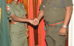 Corporal Ross-Cox being congratulated by COS Mark Phillips (GDF photo)