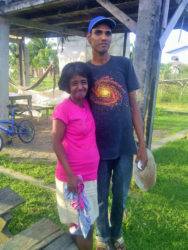 Vanessa Sookram with her common-law husband Suresh Ganesh, who is reported to have hacked her and their two-year-old son to death in their home yesterday at Crane, West Coast Demerara. 