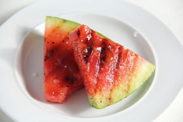 Grilled Watermelon dressed with honey, sea salt, and black pepper Photo by Cynthia Nelson