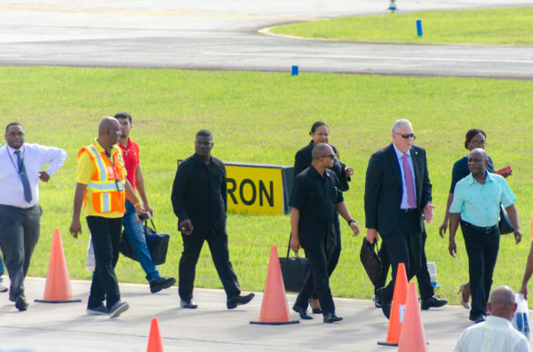 St Lucia Prime Minister Allen Chastanet (second from right) and his team being welcomed by Guyana’s Minister of Foreign Affairs Carl Greenidge (right) at the Eugene F. Correia International Airport yesterday afternoon. The Prime Minister is in Guyana for the 37th Regular Meeting of the Conference of Hads of Government of the Caribbean Community which begins today.