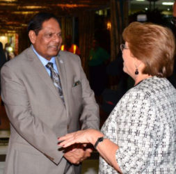 Prime Minister Moses Nagamootoo greets Chilean President Michelle Bachelet at the CJIA (GINA photo) 