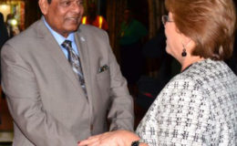 Prime Minister Moses Nagamootoo greets Chilean President Michelle Bachelet at the CJIA (GINA photo)
