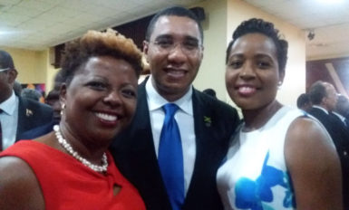 Cecile Watson (left) andValrie Grant (right) with Prime Minister of Jamaica Andrew Holness
