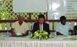 From left at head table are Minister of Agriculture Noel Holder; Japanese Ambassador to Guyana  Mitsuhiko Okada and Chief Executive Officer of the National Drainage and Irrigation Authority, Frederick Flatts (GINA photo)