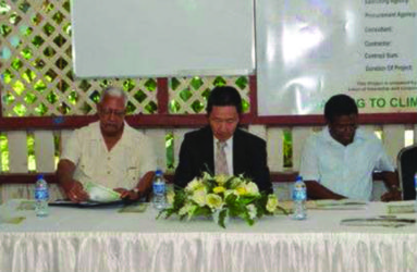 From left at head table are Minister of Agriculture Noel Holder; Japanese Ambassador to Guyana  Mitsuhiko Okada and Chief Executive Officer of the National Drainage and Irrigation Authority, Frederick Flatts (GINA photo)