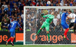 Germany’s Manuel Neuer attempts to claim the ball leading to France’s Antoine Griezmann scoring their second goal REUTERS/Kai Pfaffenbach Livepic