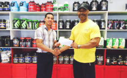 GABBFF, VP, Hugh Ross (right) receiving the sponsorship cheque from Fitness Express’ CEO, Jamie McDonald on Thursday at the company’s 47 John and Sheriff Streets location.
