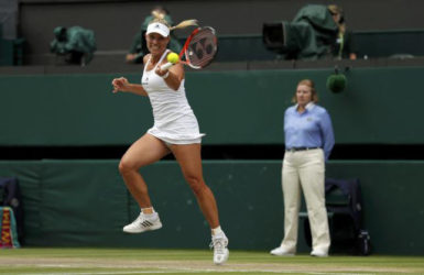 Angelique Kerber plays a forehand return during yesterday’s Wimbledon women’s singles final against Serena Williams. (Reuters photo) 