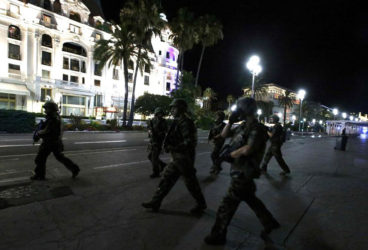 French soldiers advance on the street after at least 80 people were killed in Nice, France, when a truck ran into a crowd celebrating the Bastille Day national holiday July 14, 2016. REUTERS/Eric Gaillard