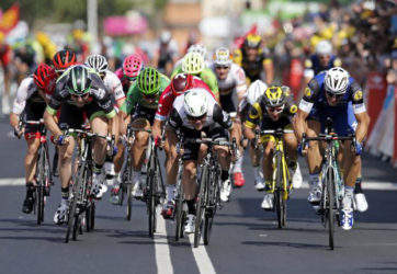 Team Dimension Data rider Mark Cavendish of Great Britain, centre, wins on the finish line. (Reuters photo) 